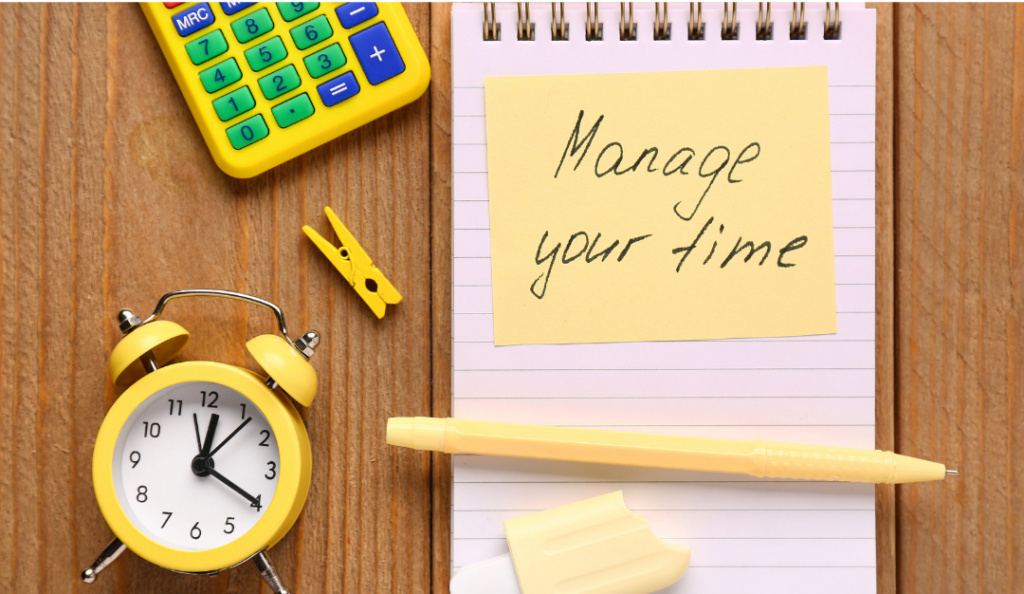 a notepad with a post-it on it saying "manage your time" - one important business system